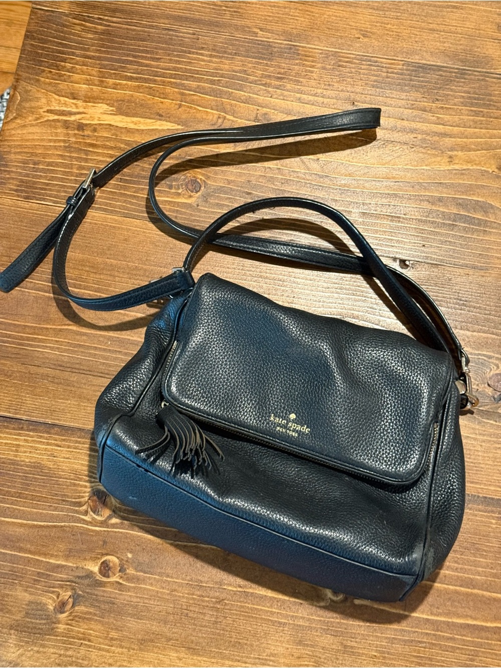 kate spade black pebbled leather shoulder bag with tassel